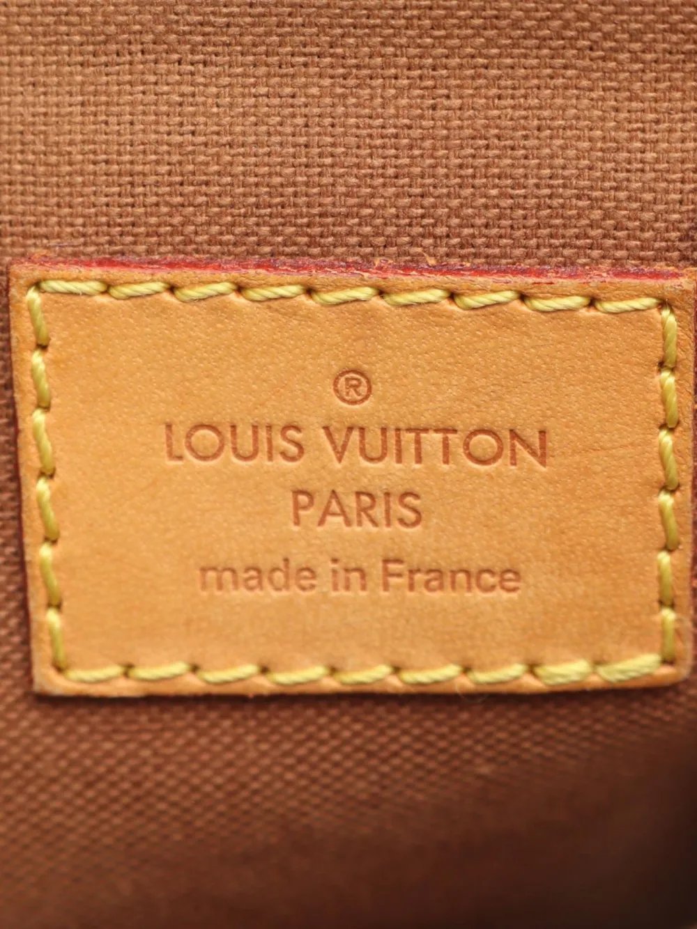 Pre-owned Louis Vuitton 2009 Tivoli Gm Monogram Canvas Tote Bag In Brown