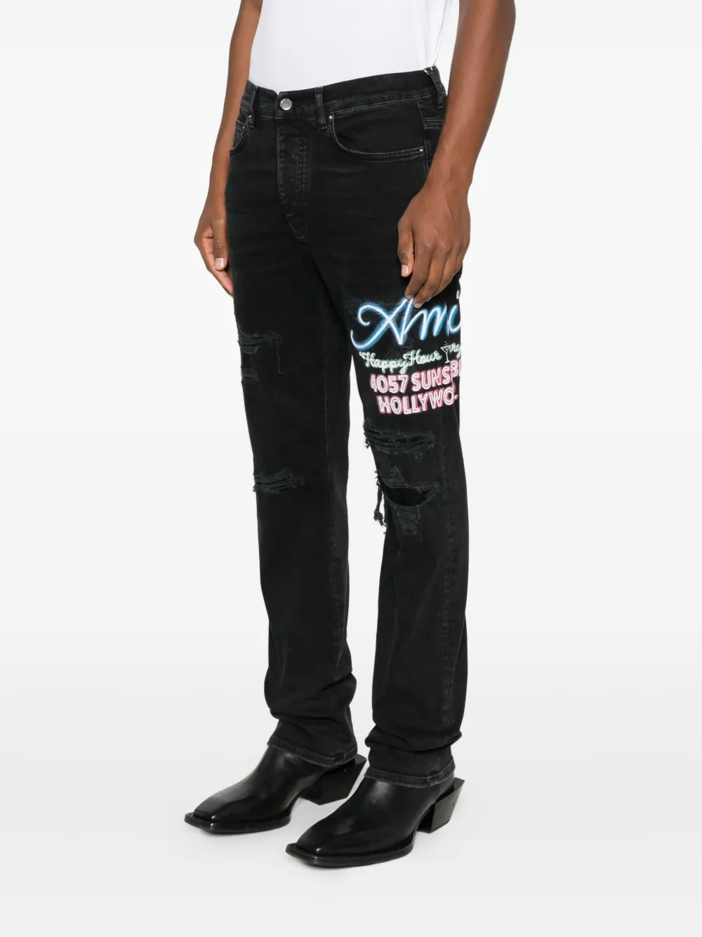 AMIRI Gerafelde jeans met borduurwerk Zwart