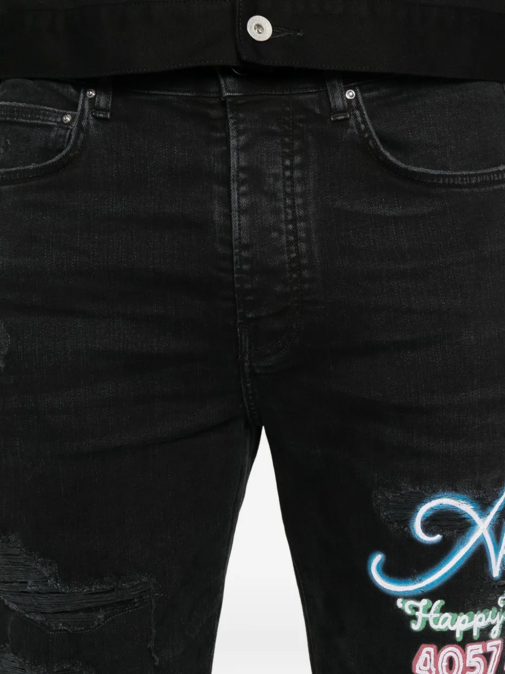 AMIRI Gerafelde jeans met borduurwerk Zwart