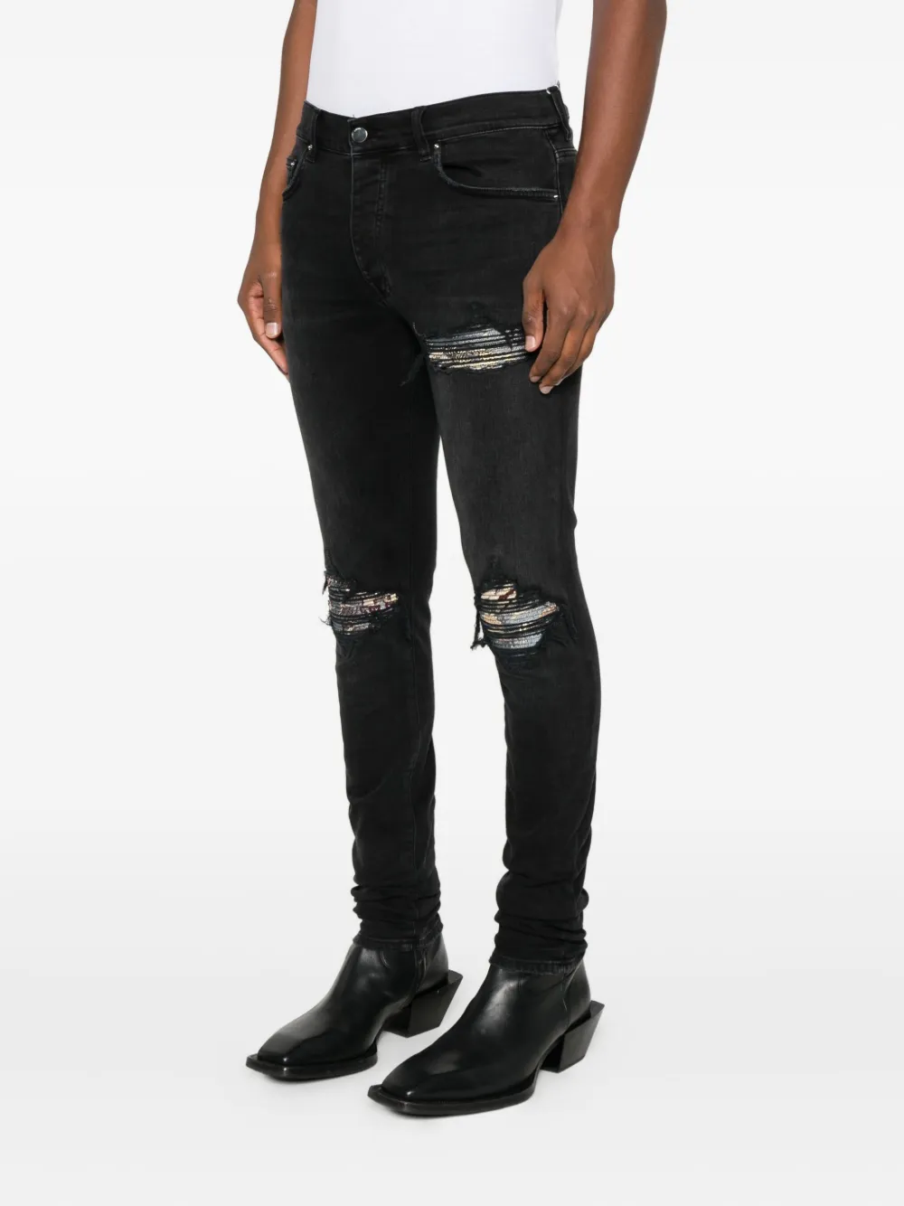 Amiri Patchwork-distressed Cotton Jeans In Black