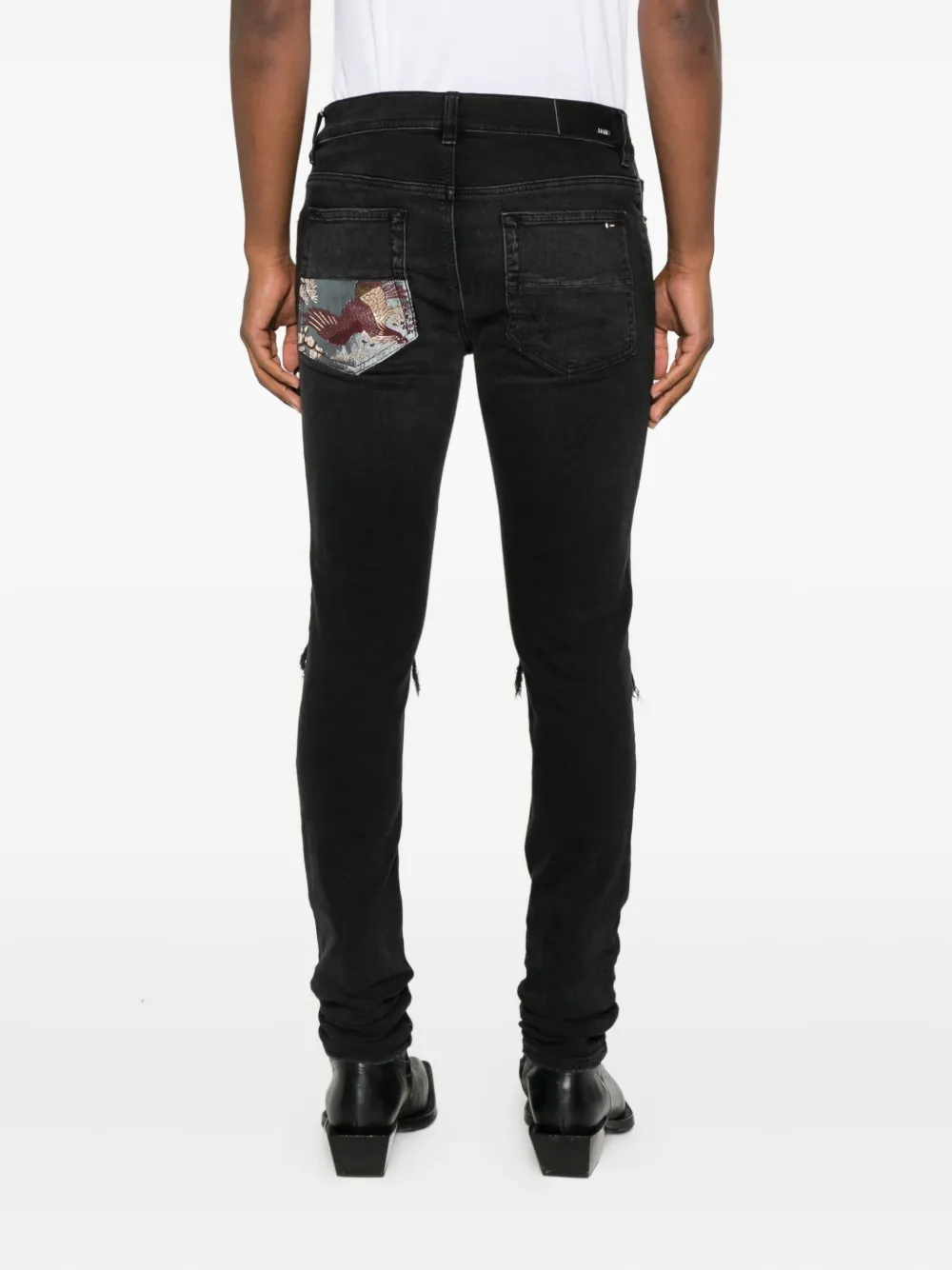 Amiri Patchwork-distressed Cotton Jeans In Black