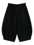 Black Comme Des Garçons elasticated trousers