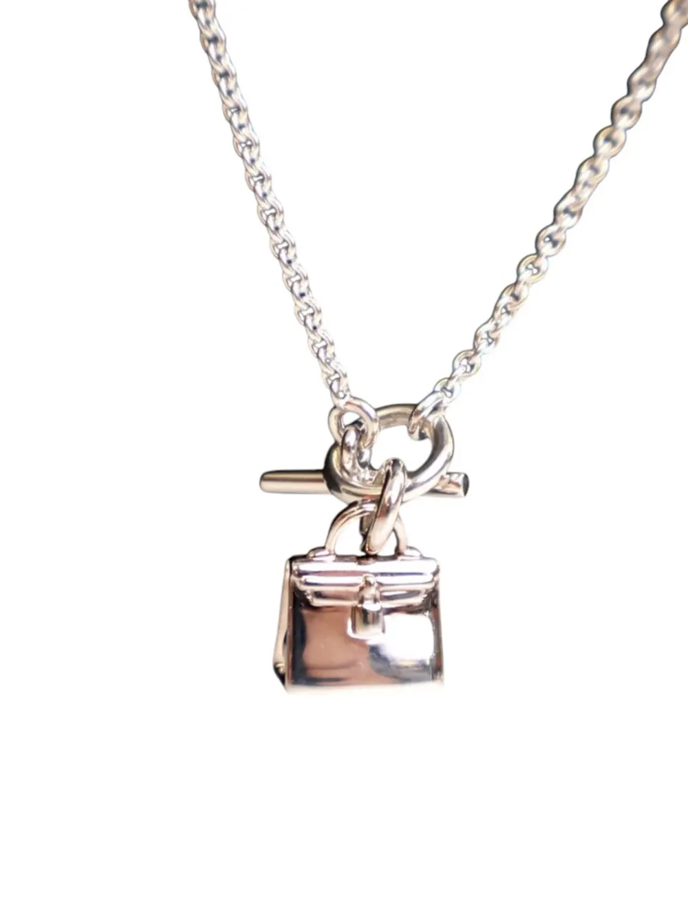 Hermès Pre-Owned 2020-2025 Sterling Silver Amulettes Kelly Pendant Hermès Pre-Owned 2020-2025 Sterling Silver Amulettes Kelly Pendant