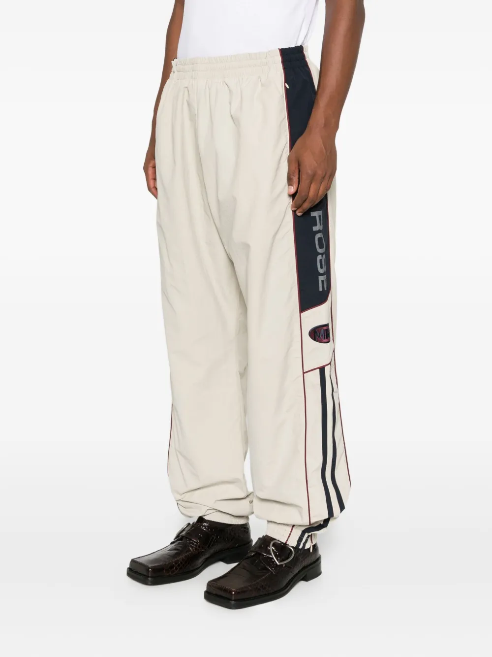 Martine Rose Side-stripe Elasticated Track Pants In Gold