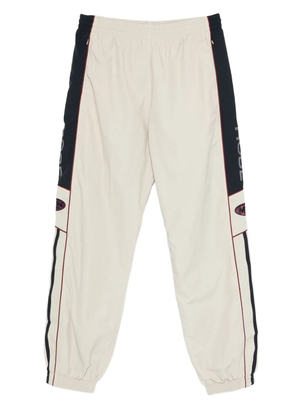 Martine Rose side-stripe elasticated track pants | Neutrals | Image 1