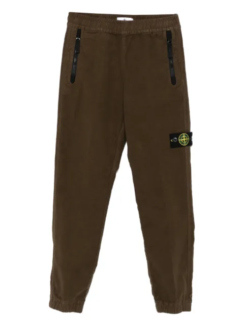 Stone Island Junior pantalones con bolsillos con cierre
