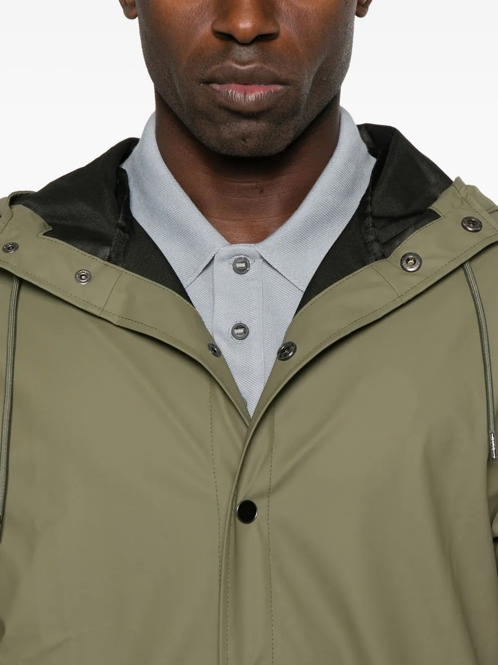 Rains Jas met capuchon en knopen Groen