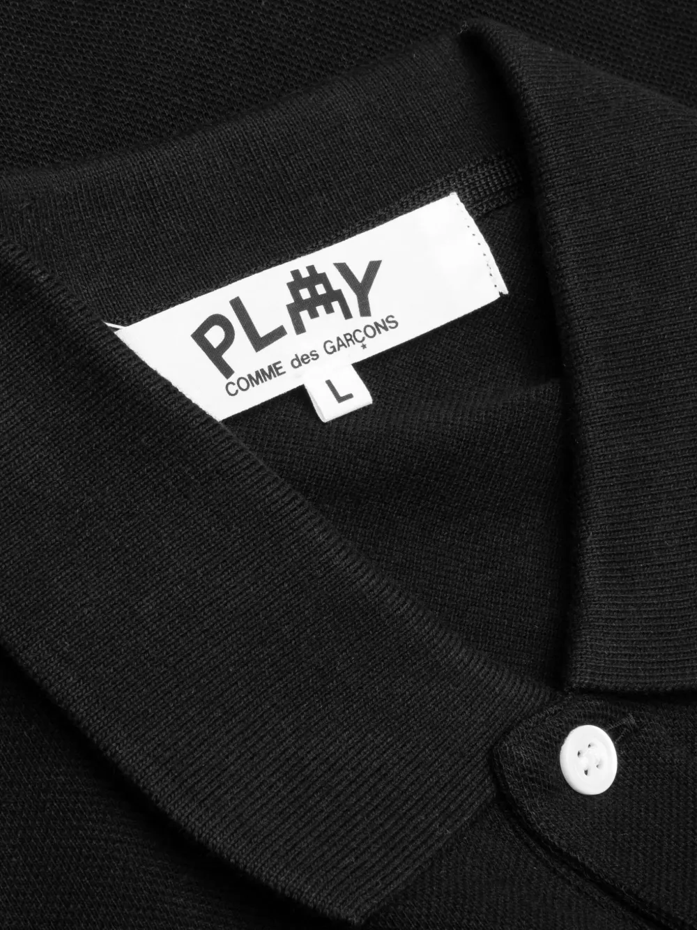 Comme Des Garçons Play x Invader poloshirt met borduurwerk Zwart