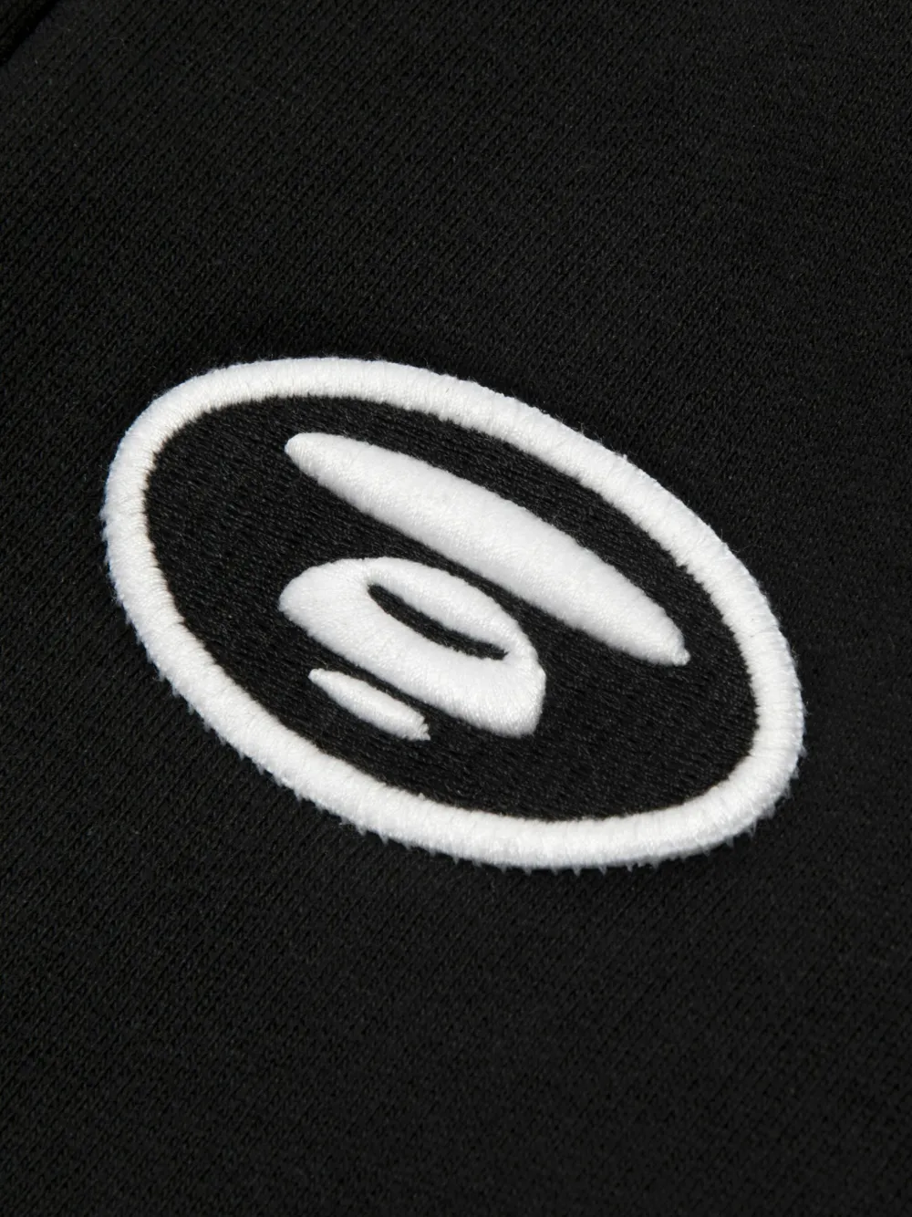 AAPE BY *A BATHING APE Trainingsbroek met geborduurd logo en cuffs Zwart