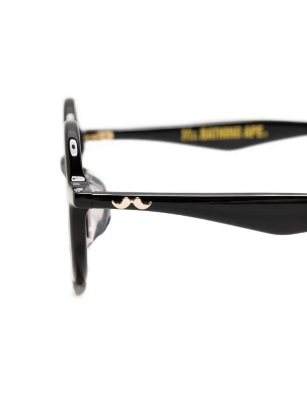 A BATHING APE ブラックフレーム メガネ A BATHING APE® ロゴ 眼鏡フレーム | ブラック | FARFETCH JP