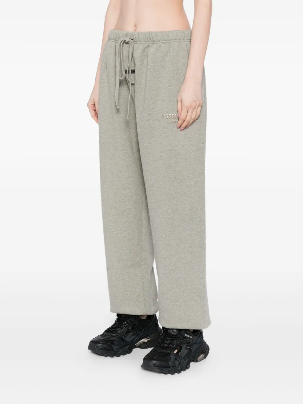 Essentials Logo-embossed Trousers In Animal Print