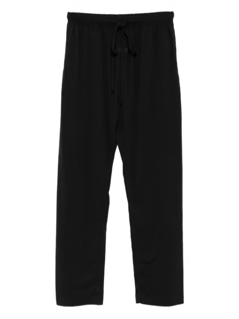 FEAR OF GOD ESSENTIALS pantalones con parche del logo