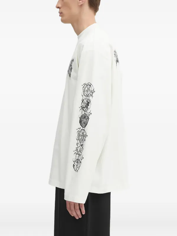 VETEMENTS ロングTシャツ ホワイト VETEMENTS graphic-print long-sleeve T-shirt | Neutrals | FARFETCH