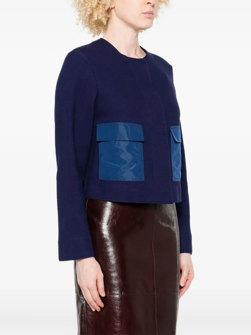 Niu Bolero met opgestikte zak Blauw