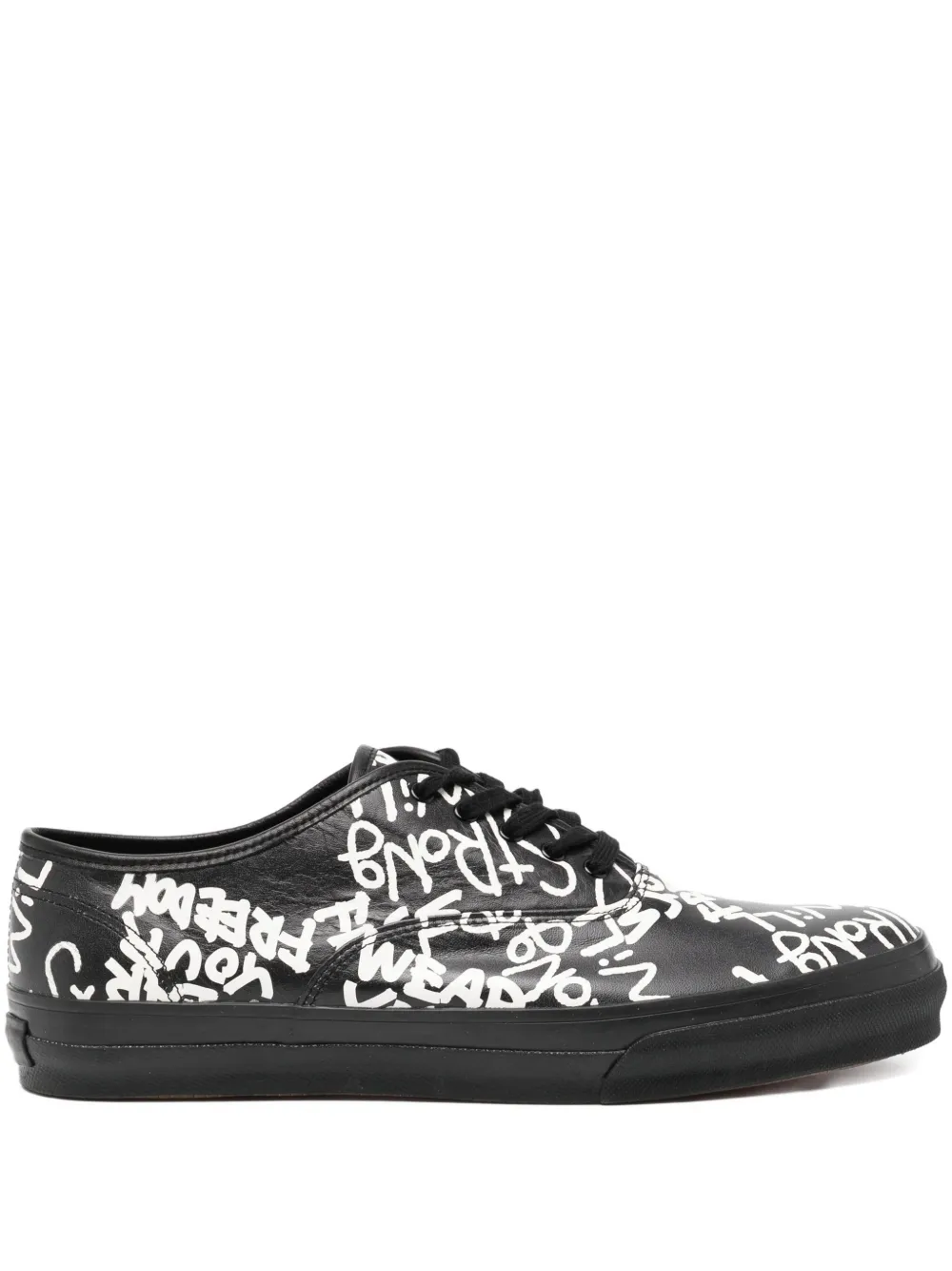 Comme Des Garçons Comme Des Garçons slogan-print sneakers | Black | Image 1
