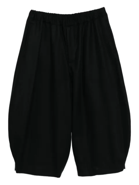 Black Comme Des Garçons cropped tapered trousers