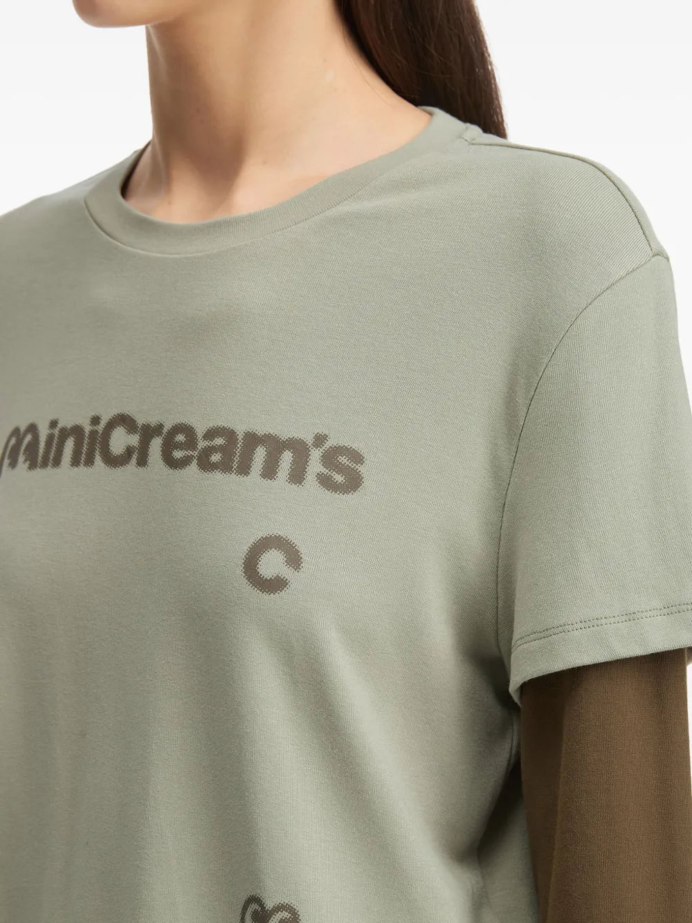 Mini Cream Layered Graphic Top In Green
