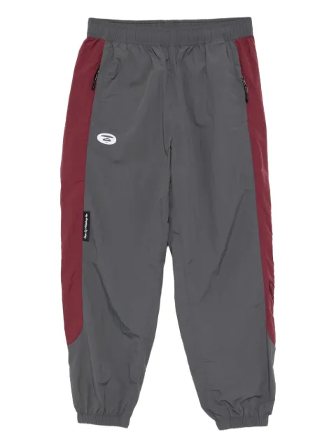 AAPE BY *A BATHING APE® logo-embroidered trousers 