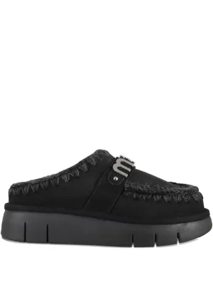 Toga Pulla eyelet-metal Mules | Black | FARFETCH