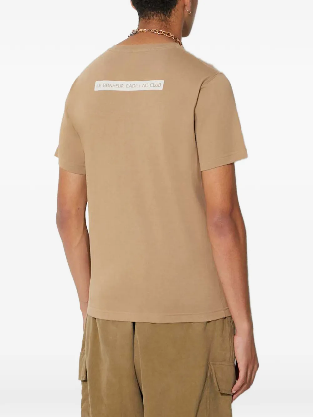 Universal Works T-shirt met logoprint Beige
