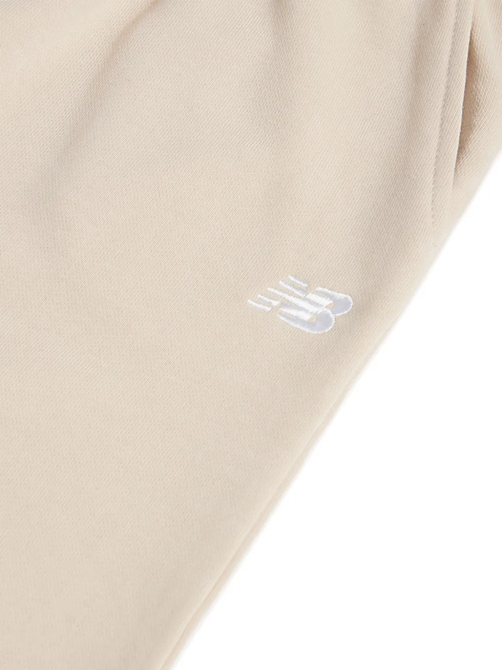 New Balance Kids Broek met geborduurd logo Beige