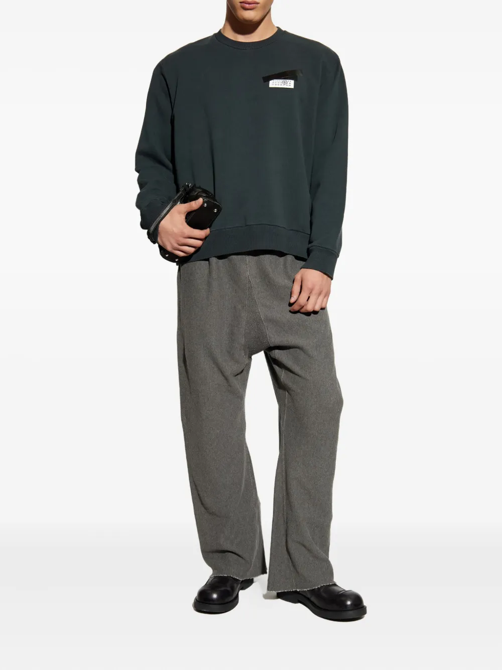 Maison Margiela elastic-waist frayed-hem trousers - Grijs
