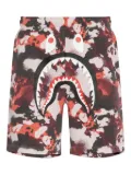 A BATHING APE® shark-head camo shorts - Red