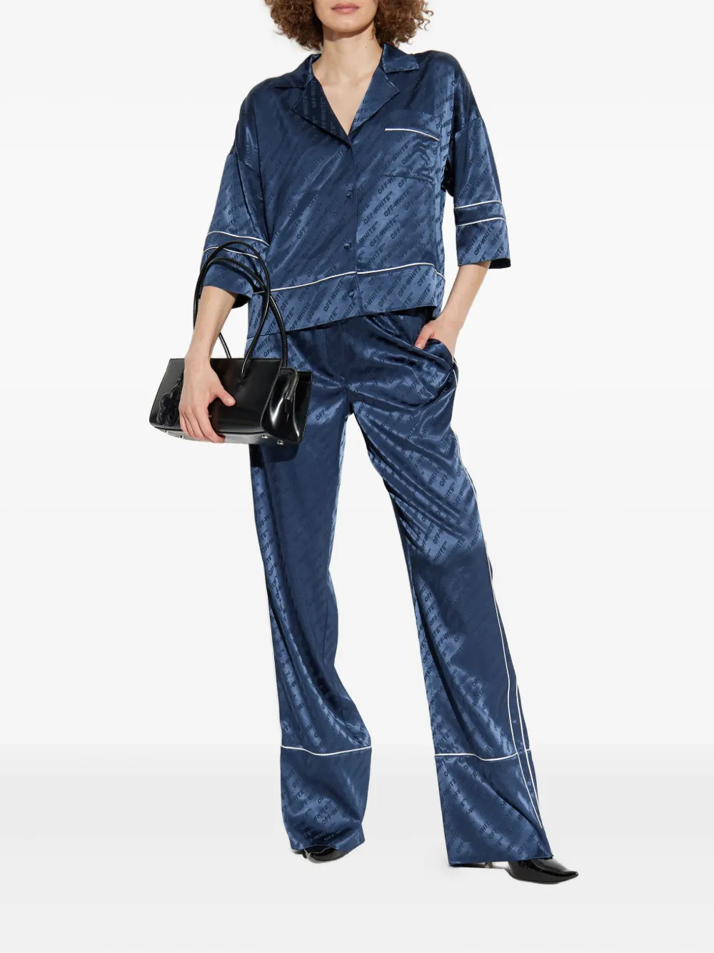 Off-White logo-pattern piped trousers - Blauw