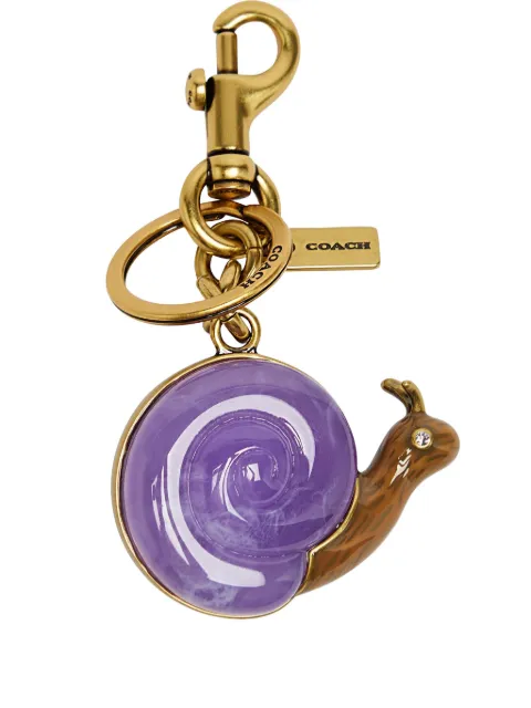 Coach llavero con detalle de caracol pequeño