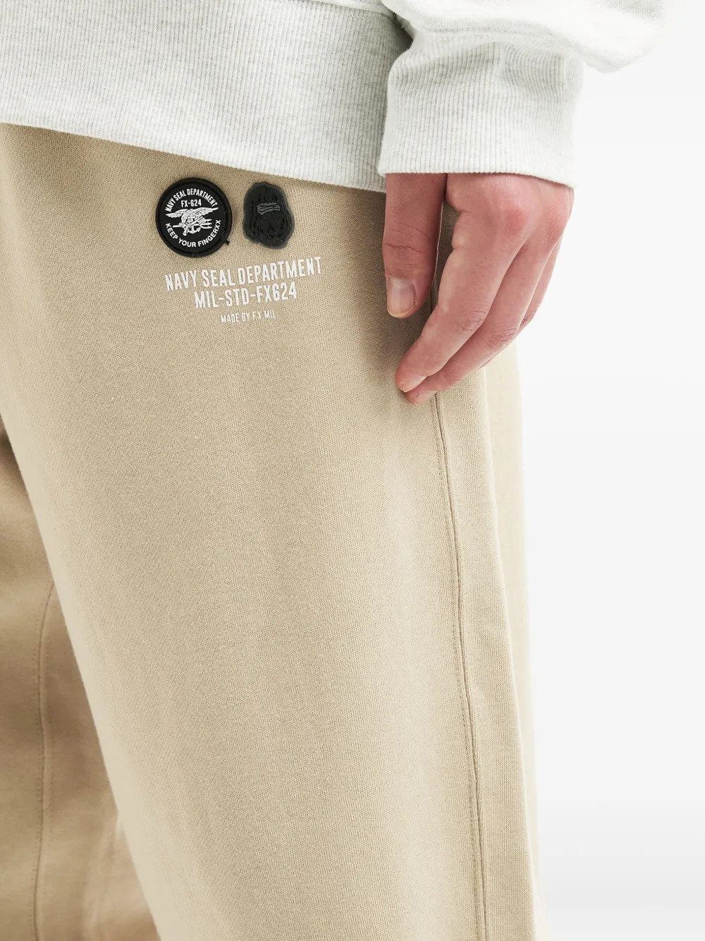 Fingercroxx Logo-patch Cuffed Track Pants In Multi