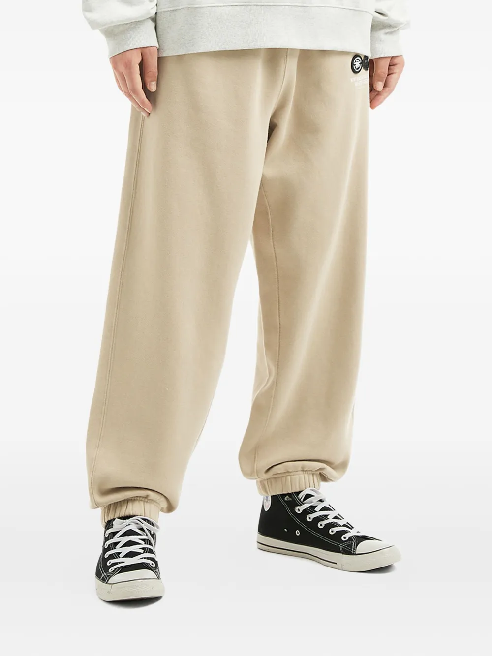 Fingercroxx Logo-patch Cuffed Track Pants In Multi