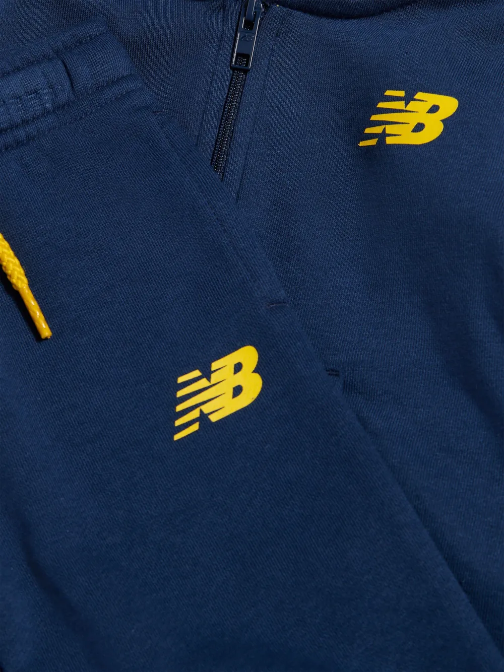 New Balance Kids Trainingspak met logoprint en rits Blauw