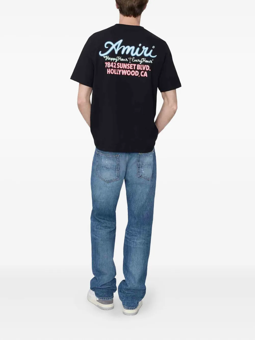 AMIRI Gerafelde denim jeans met gescheurde knieën Blauw