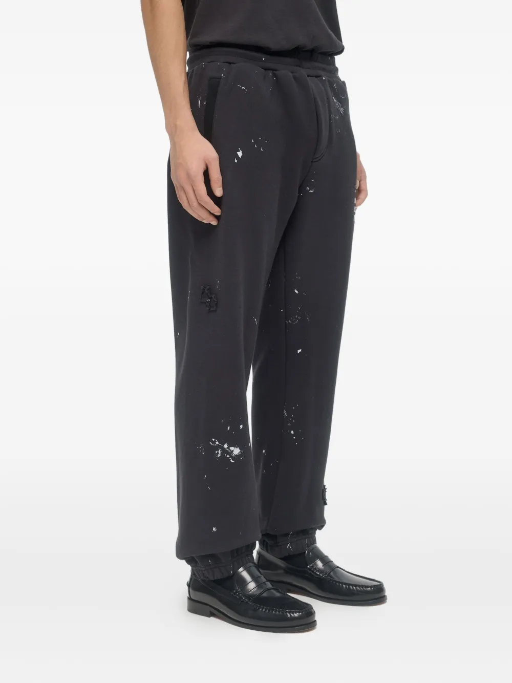 DOMREBEL Joggingbroek met verfspatten Zwart