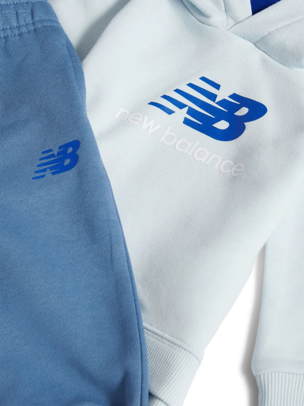 New Balance Kids Trainingspak met logoprint Blauw