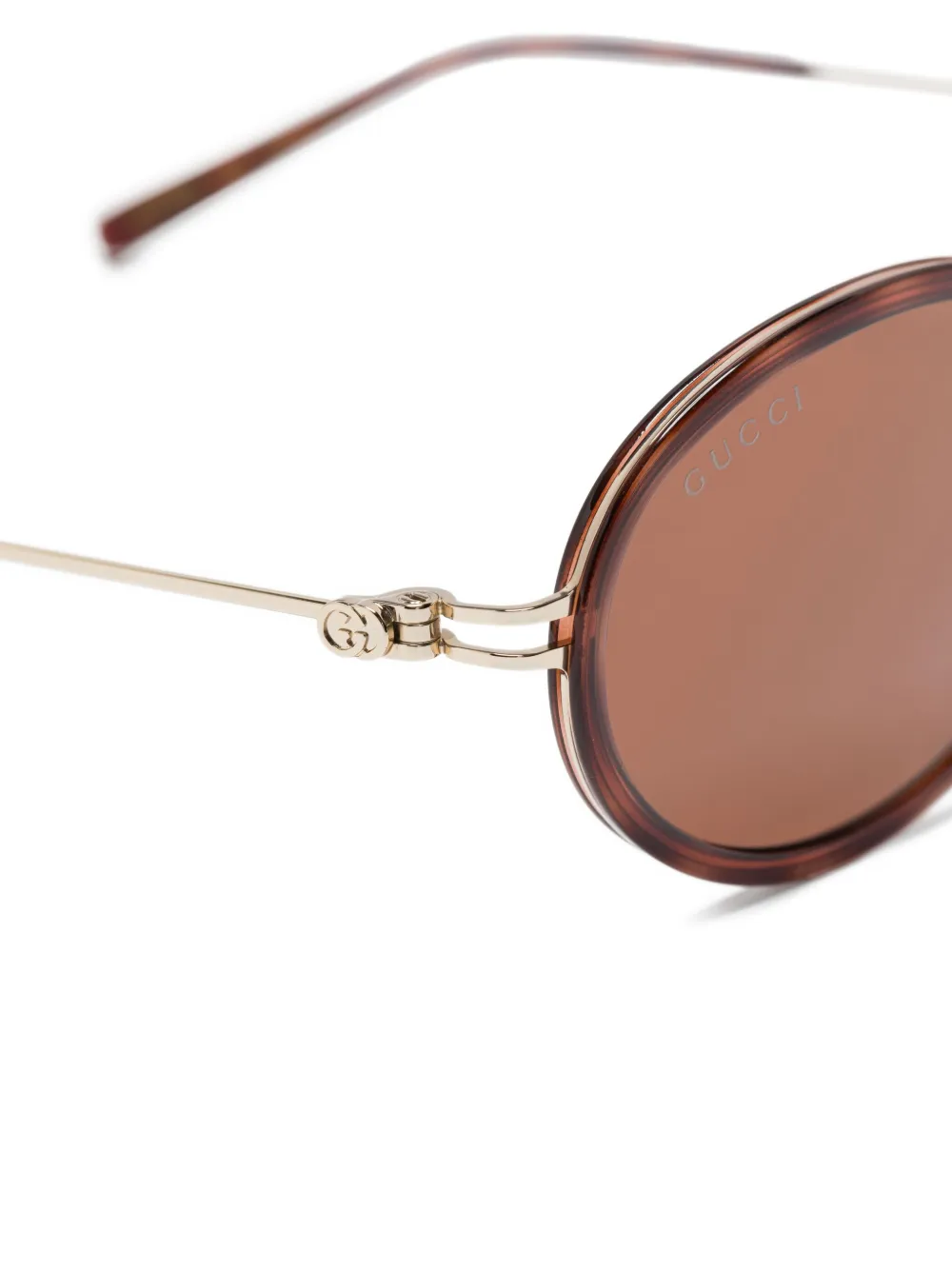 Gucci Eyewear Zonnebril met ovalen montuur Goud