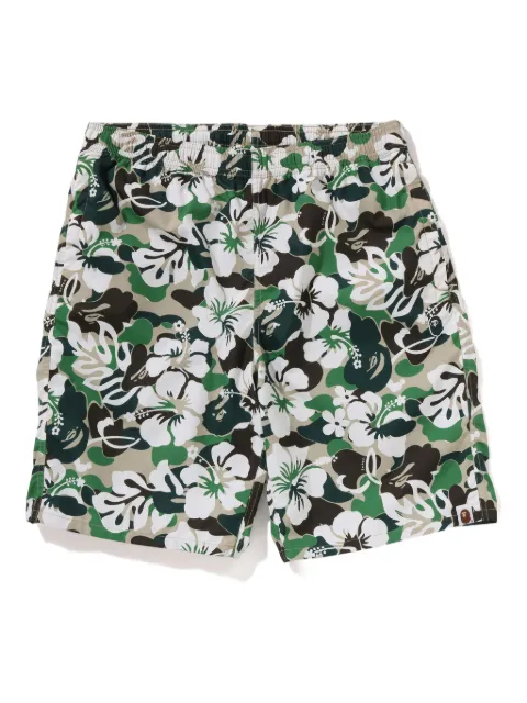 A BATHING APE® floral-print swim trunks