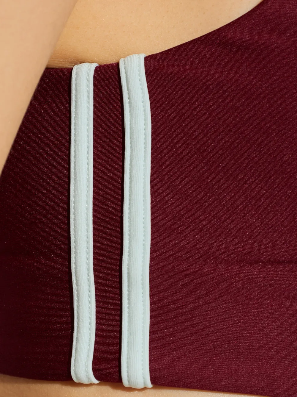 The Upside Oxford stripe-detail sports bra Rood