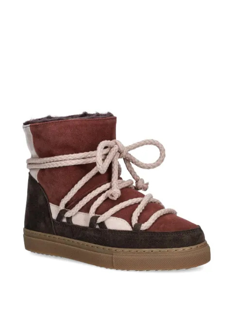 Inuikii botas con agujetas y diseño patchwork