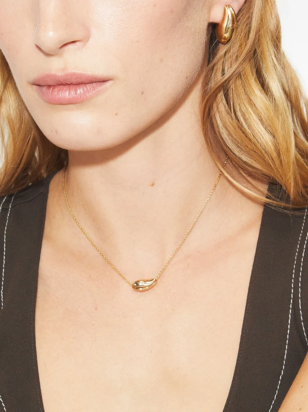 Tory Burch wave pendant necklace - Goud