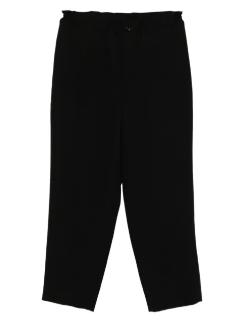 Black Comme Des Garçons wool trousers