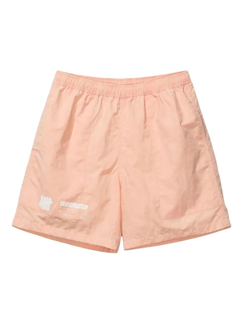 Undefeated logo-print tie-dye shorts | Orange | Image 1