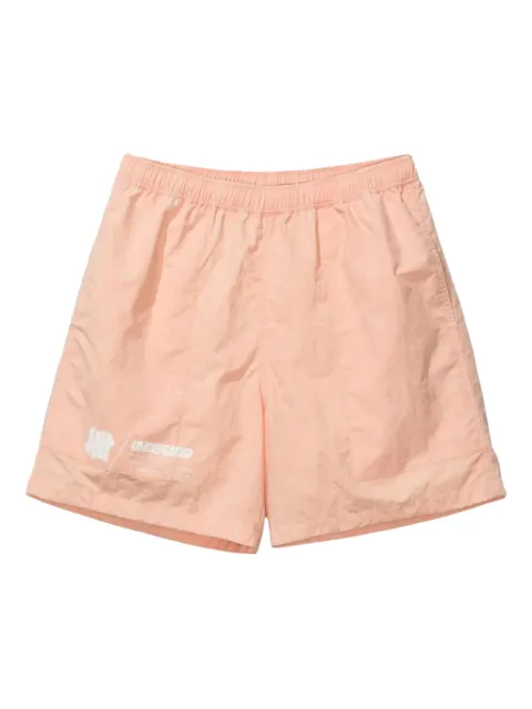 Undefeated logo-print tie-dye shorts