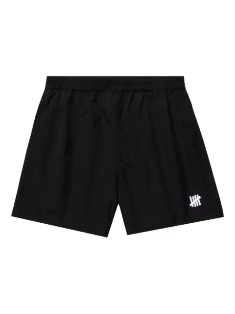 Undefeated logo-plaque swim shorts