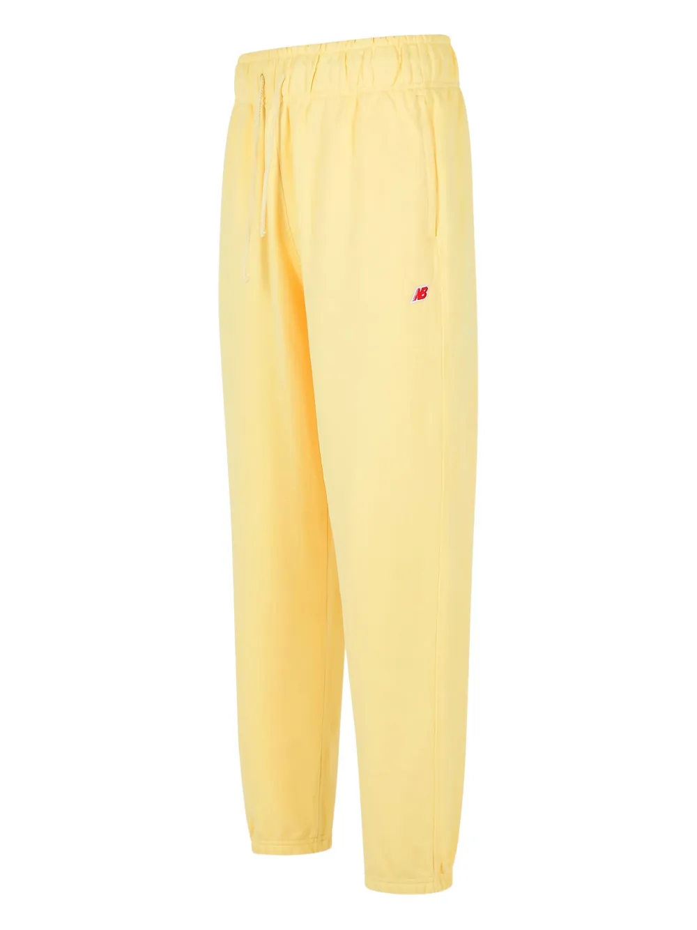 New Balance Cotton Trousers With Elastic Cuffs And Waistband In Yellow