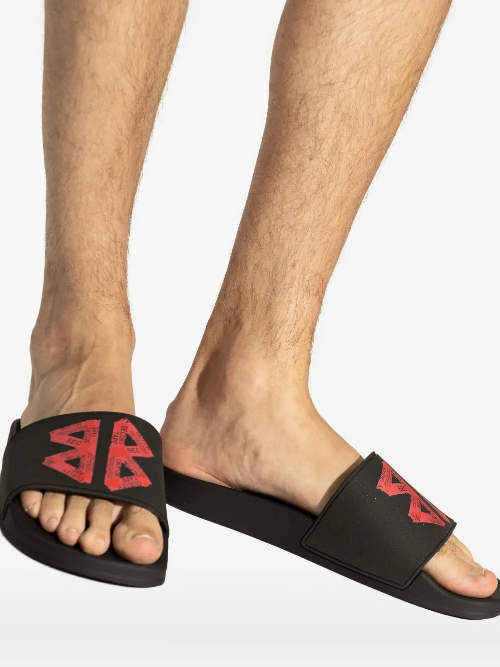 Balenciaga Slippers met logoprint Zwart