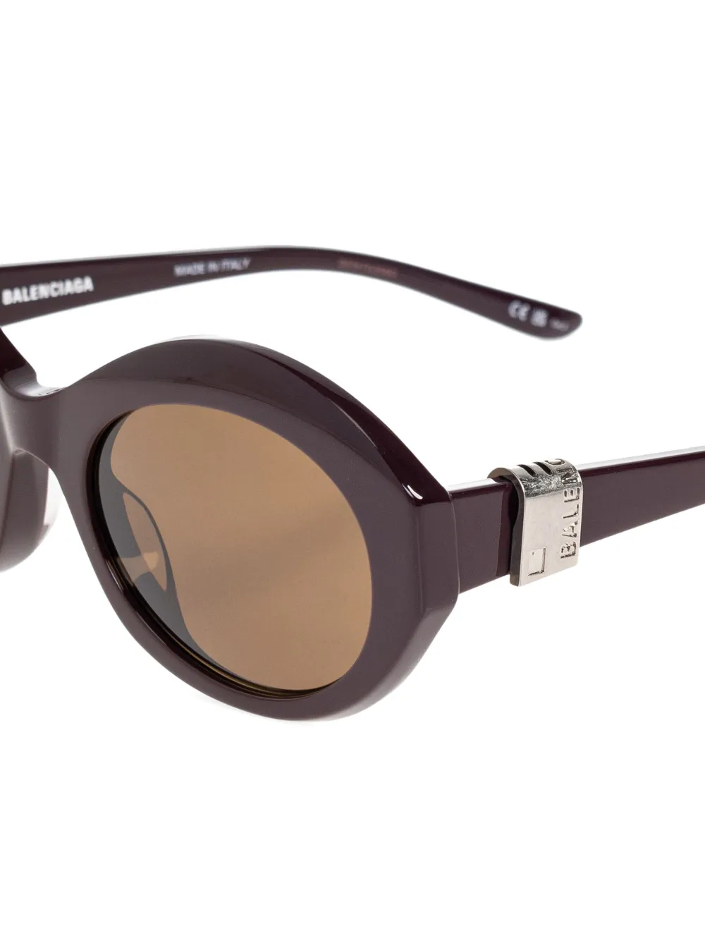 Balenciaga Eyewear Zonnebril met ovalen montuur Bruin