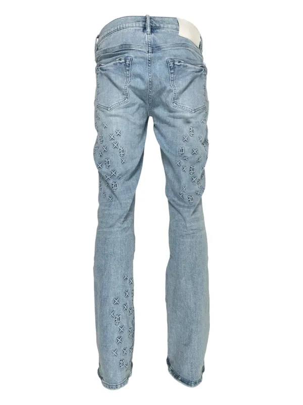 low-rise "Black Wash Blowout" slim jeans