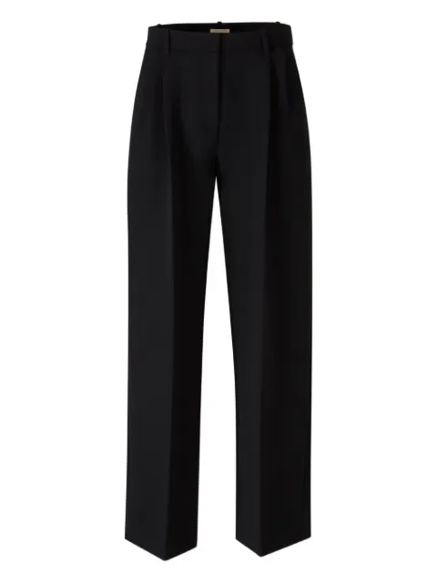 KHAITE pleated high-waisted trousers