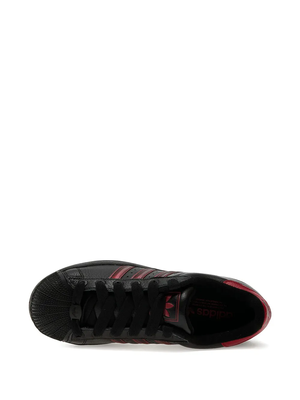 adidas Gestreepte sneakers met schelpen neus Zwart